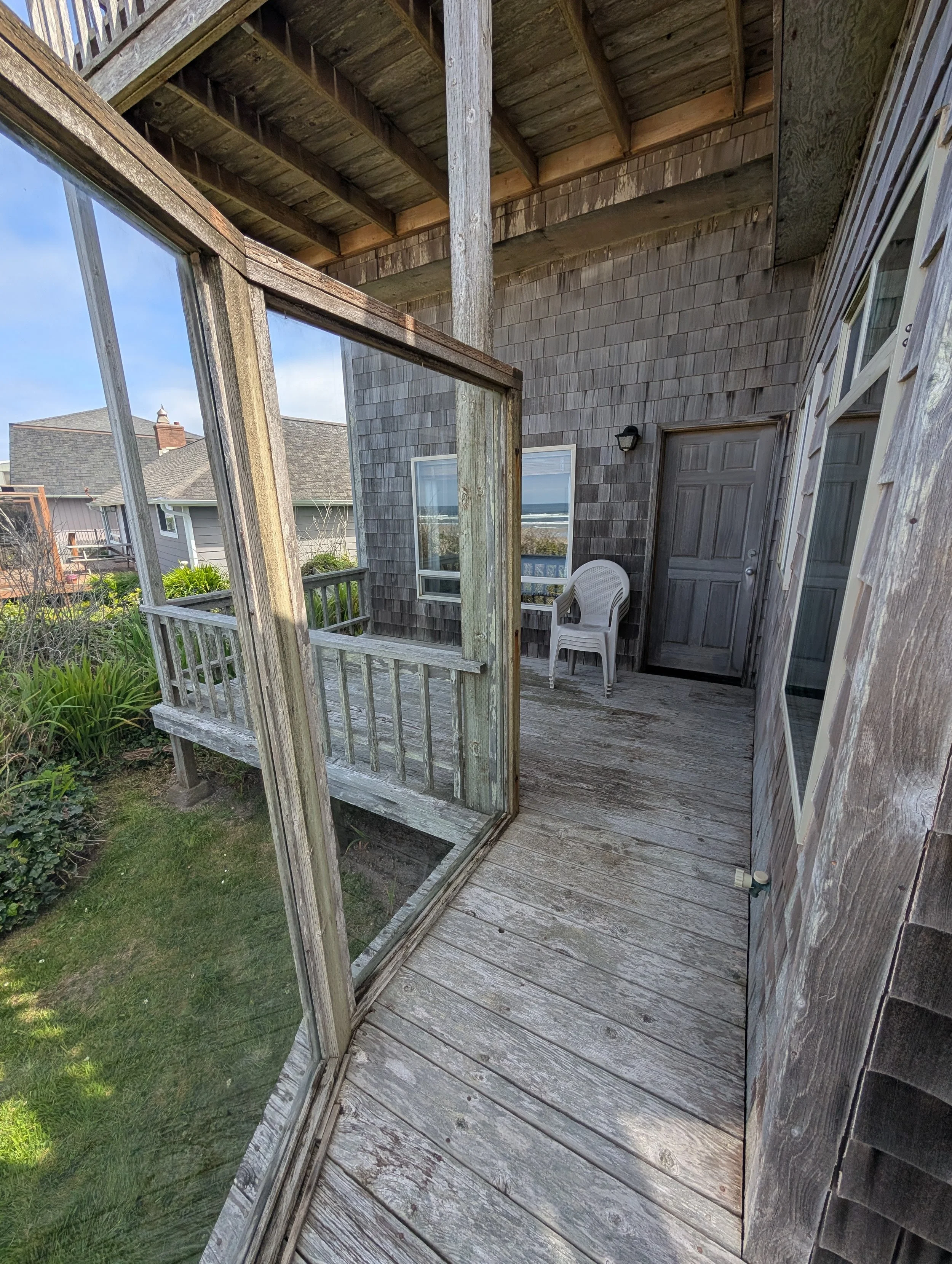 Back of deck with door do king bedroom #1 with the ocean view.

(Image taken 5/8/2026)