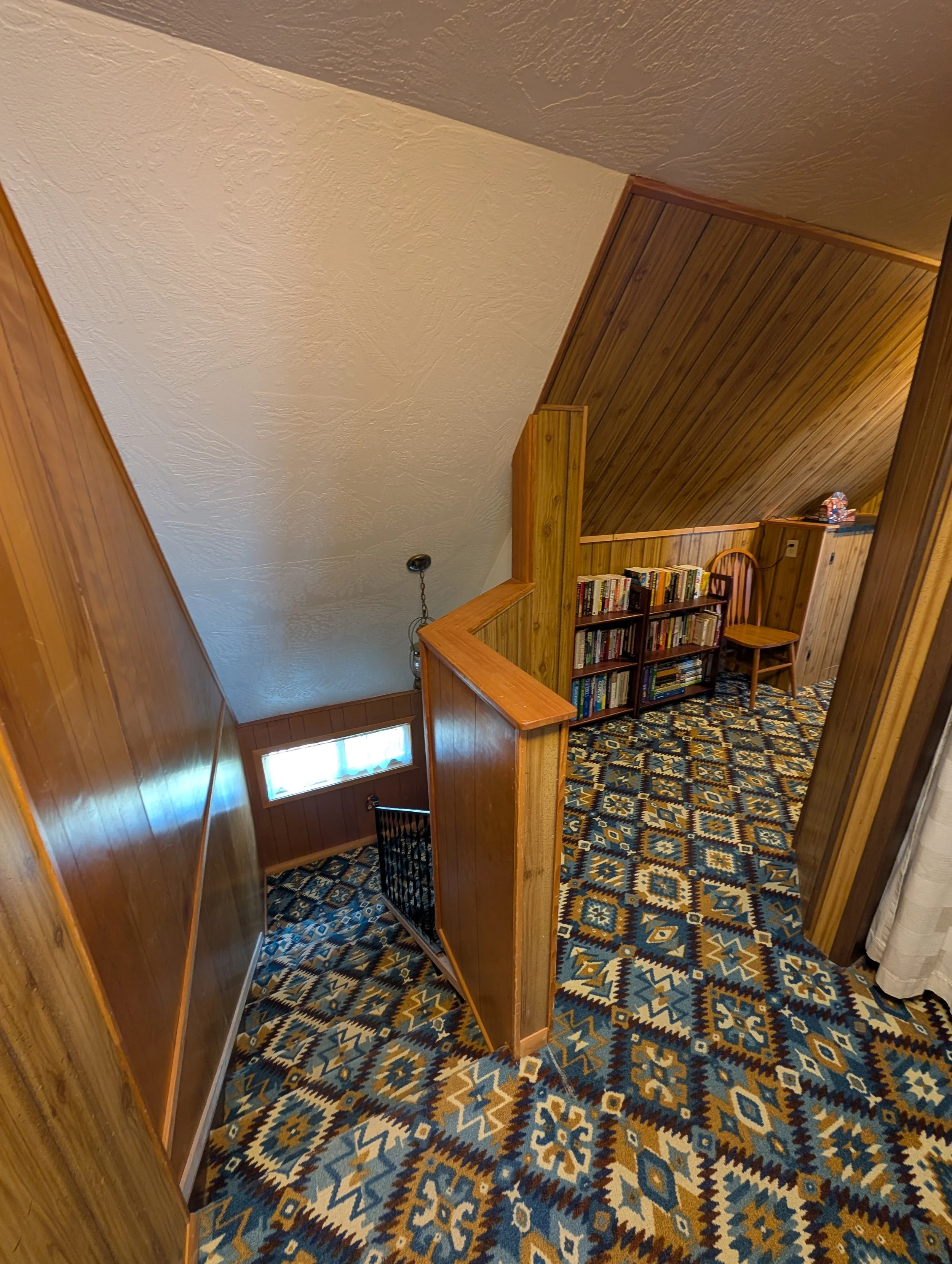 Stairway + upstairs hallway.

(Image taken on 6/2/2026)