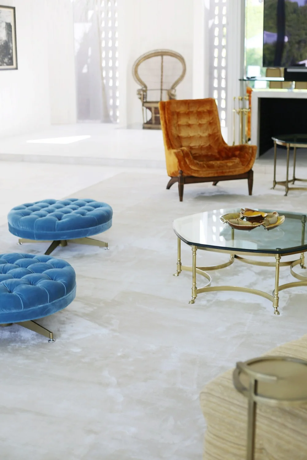  Blue swivel poofs in manner of&nbsp; Elrod &nbsp;with Sam Durant’s&nbsp; Proposal for a Monument to Huey Newton at Alameda County Courthouse &nbsp;in the background made in 2004 in Oakland, CA with bronze, stainless steel, and concrete. 