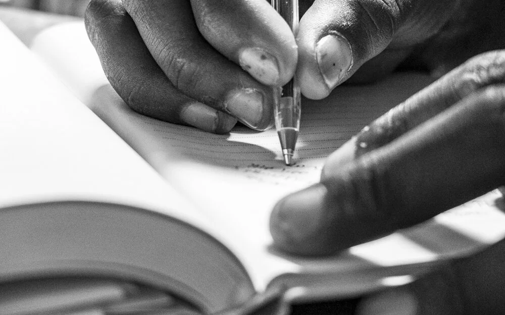  Refugees are taught to write in Italian and English by volunteers in Rome. 
