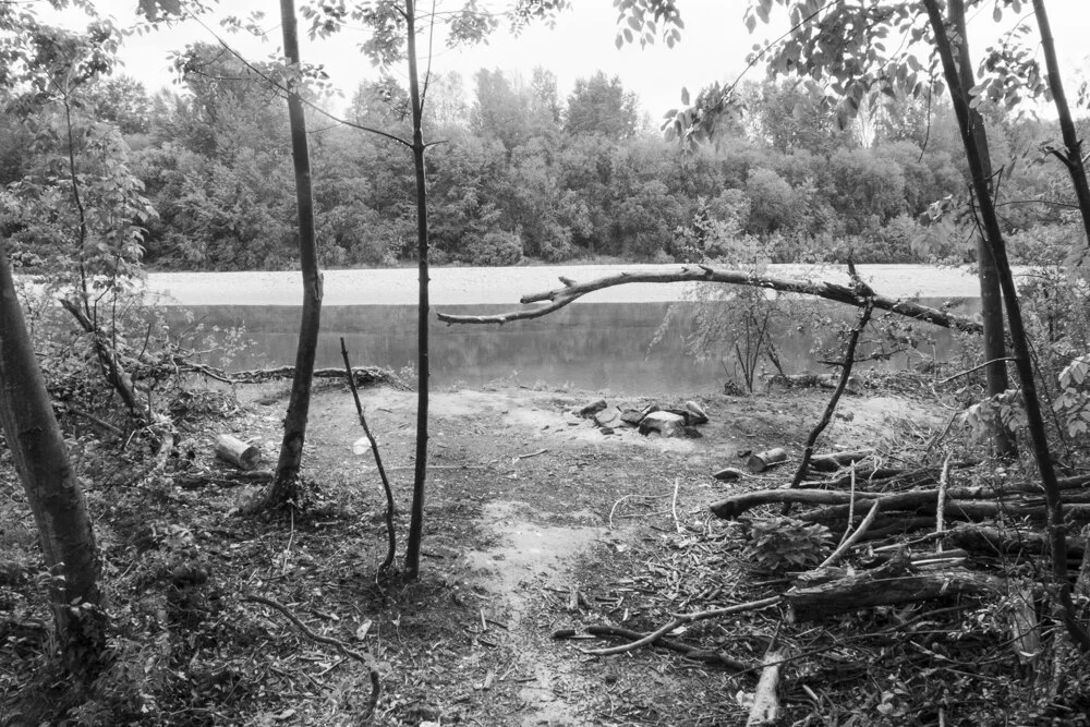   Camping Out   Many refugees take to the forest to sleep. This spot in Ostuni, Northern Italy, is known to residents as a bank that can often be seen with tents and rubbish before police will eventually clear it. 