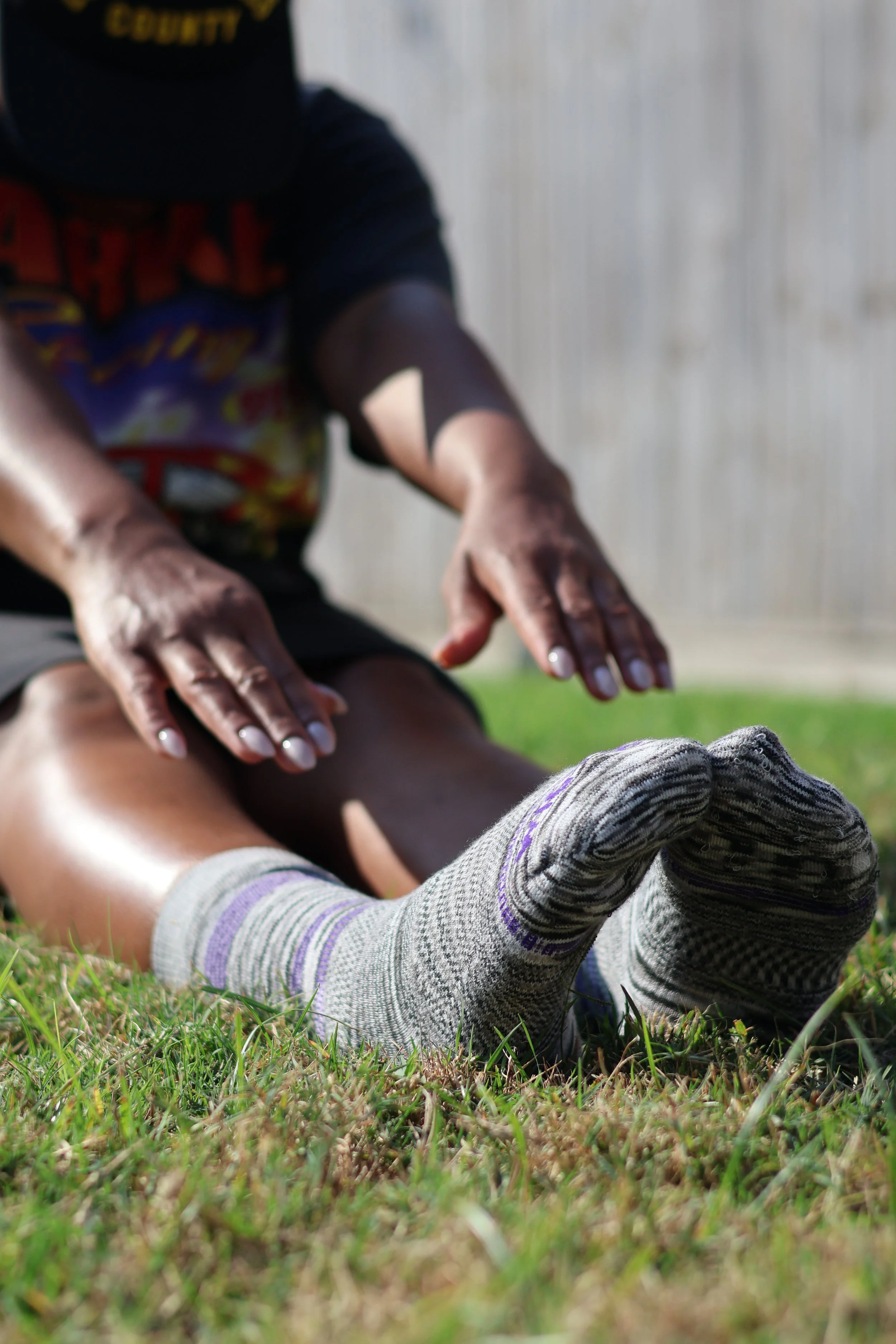 Homeschool mom wearing Wigwam contour-knit socks during outdoor movement