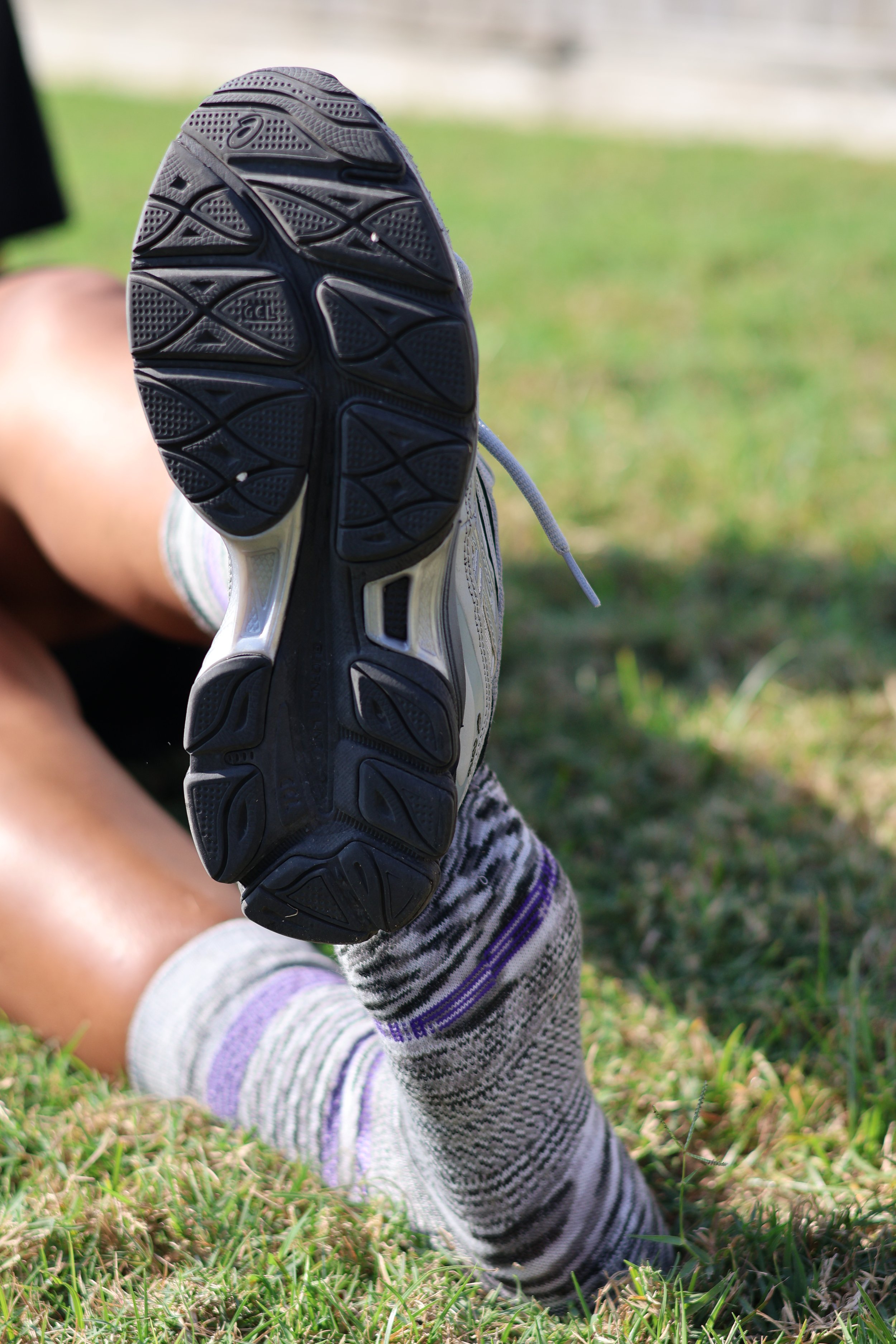 Homeschool mom wearing Wigwam contour-knit socks during outdoor movement