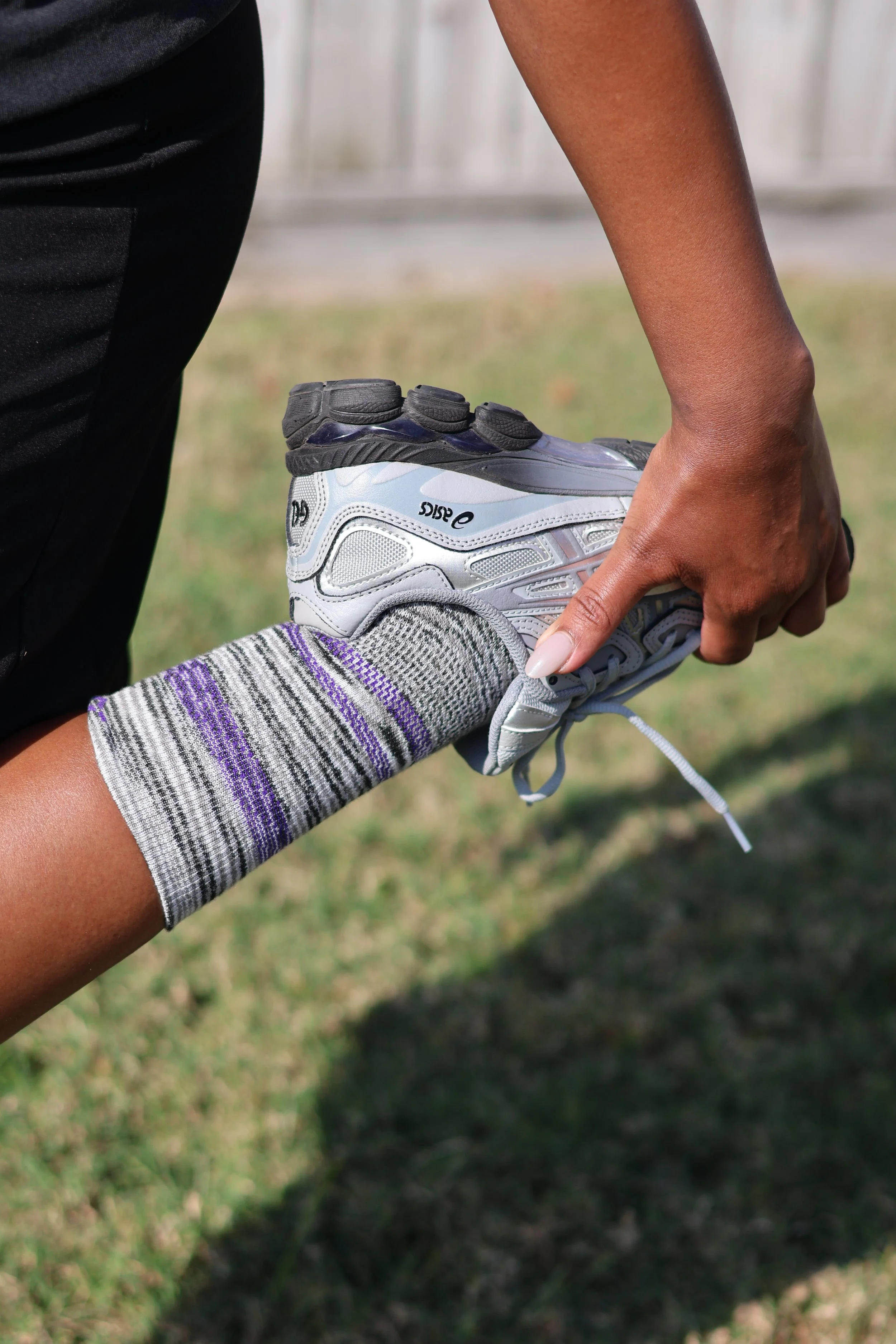 Homeschool mom wearing Wigwam contour-knit socks during outdoor movement