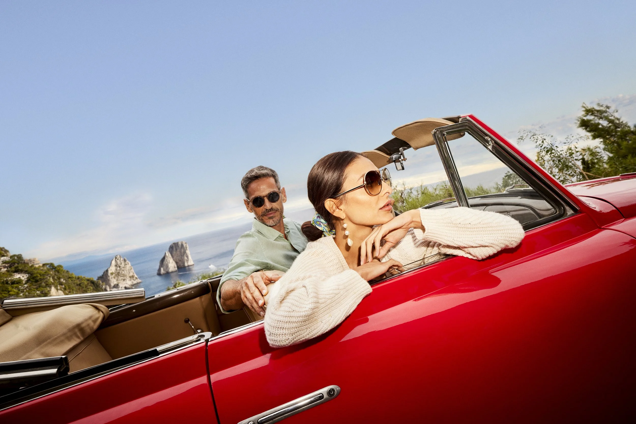 Jumeirah_Capri_Couple1 in Red Convertable.jpg