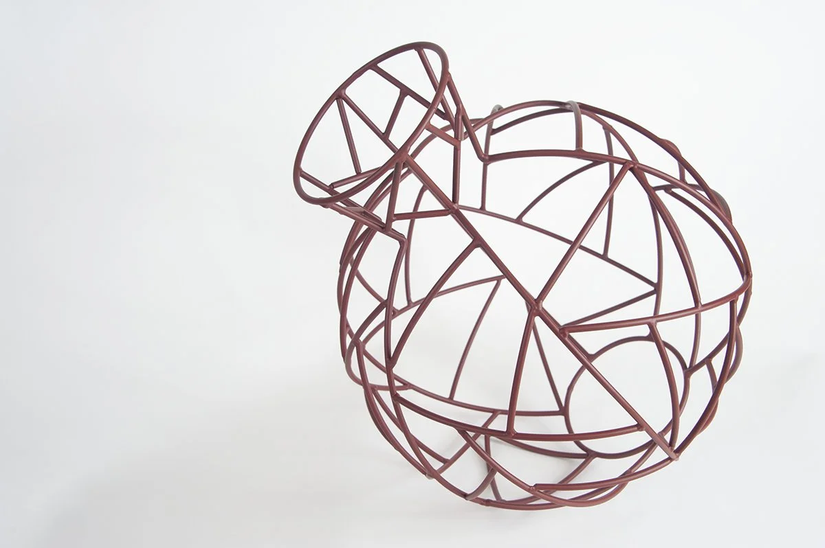 red powder coated abstract steel vessel