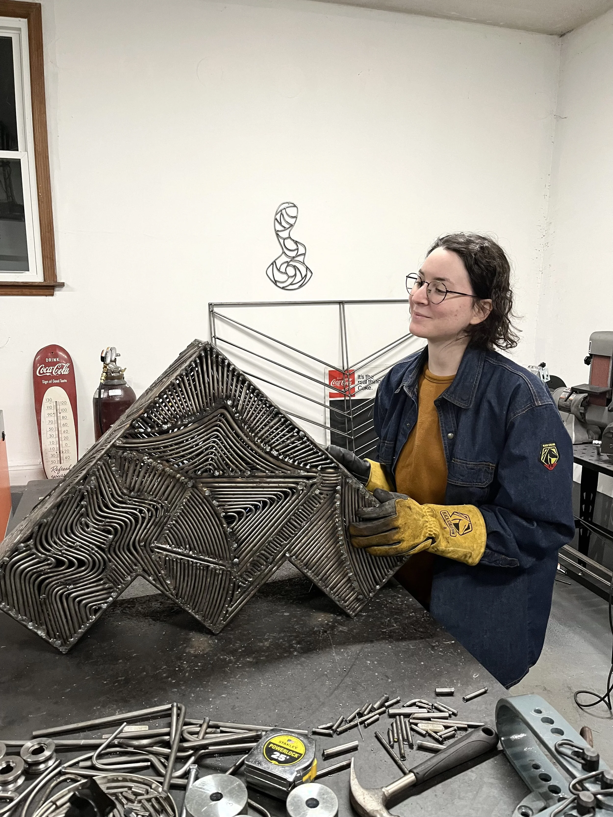 photo of jill jacobs with completed steps repeat sculpture