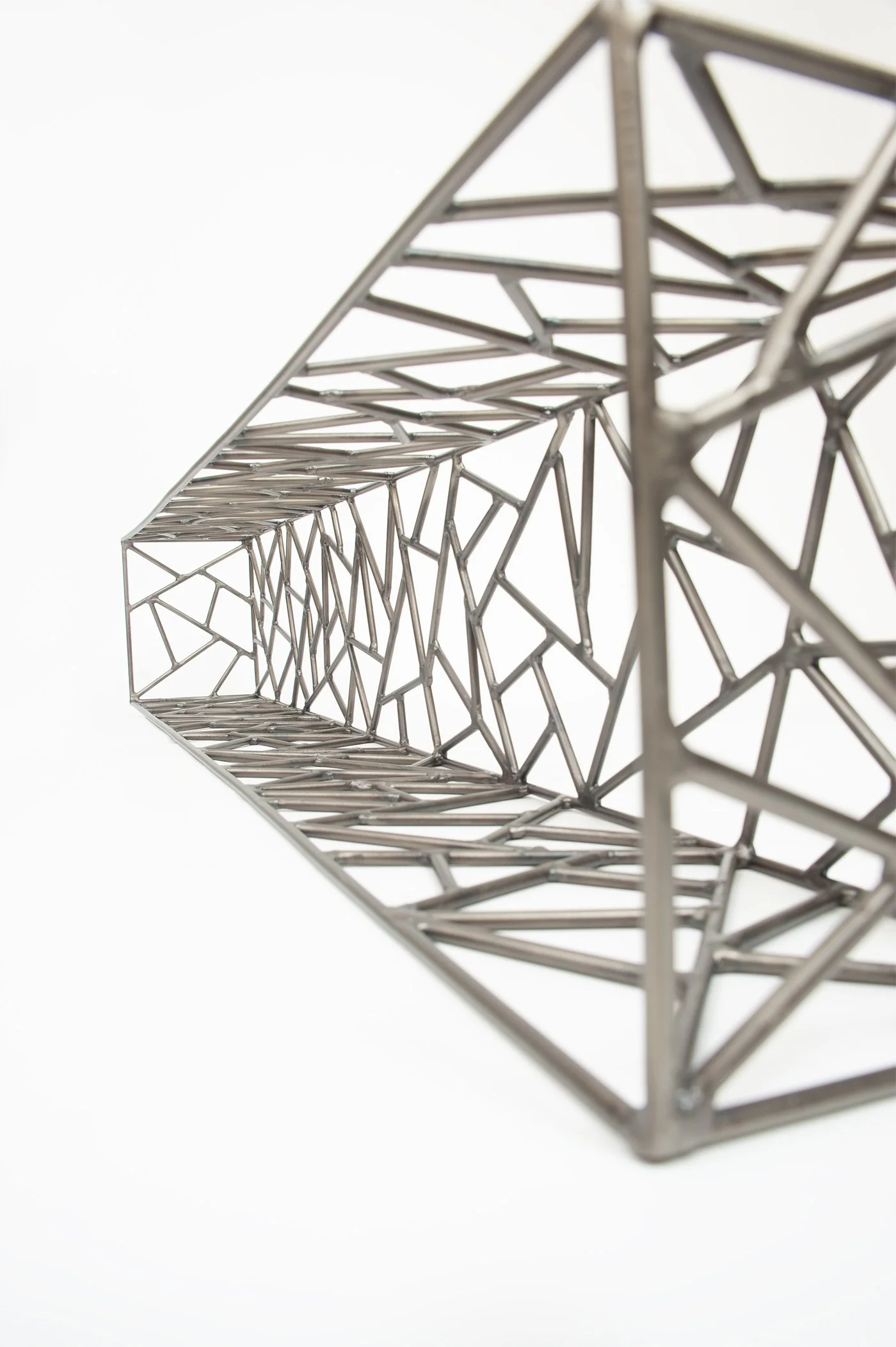 photograph of sculpture on its side in forced persepctive