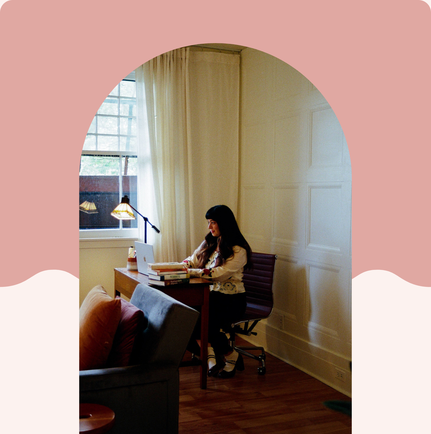 therapist at desk on call