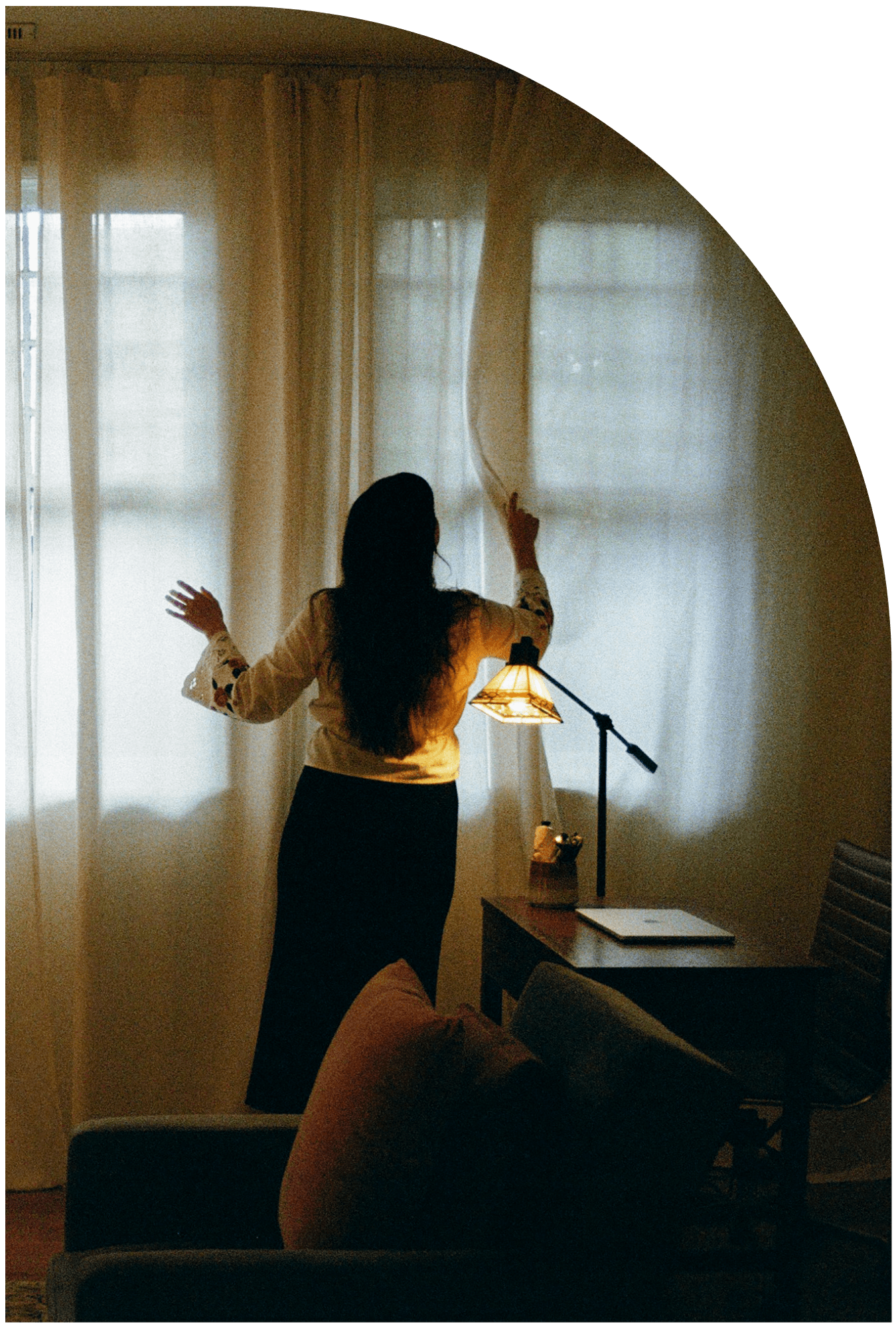 person closing curtain in therapy office