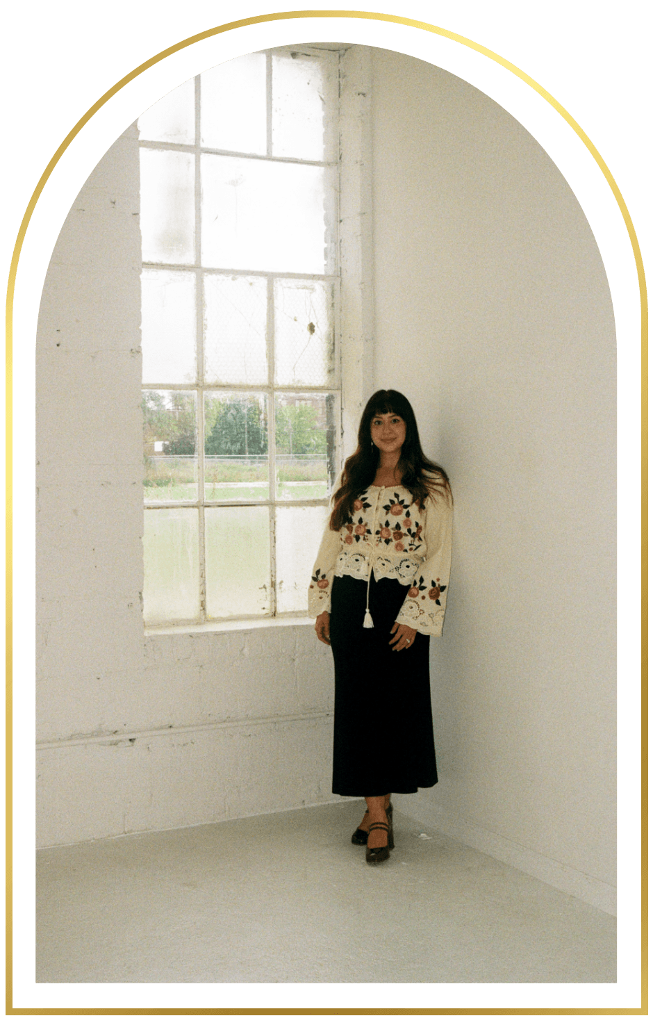 therapist standing looking at camera