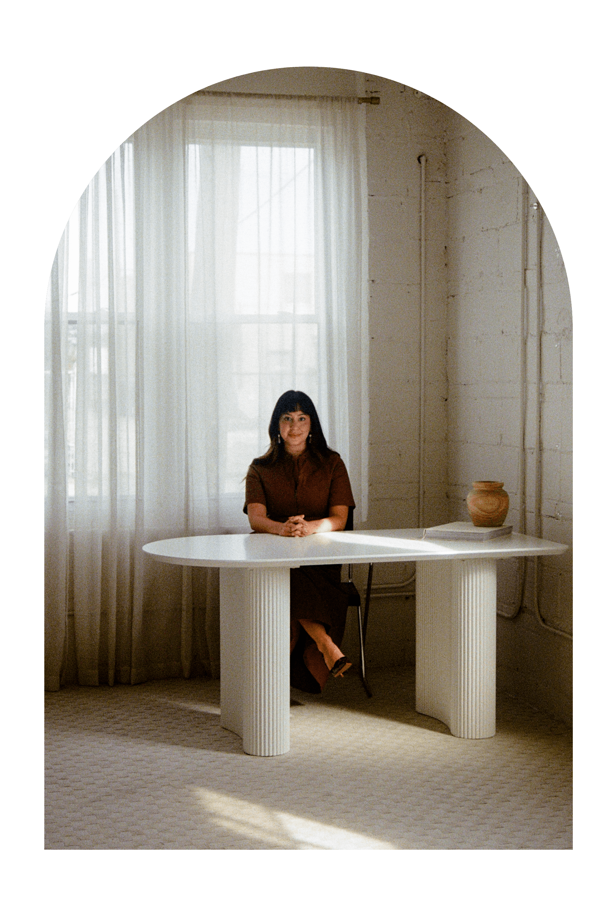 Amalia Miralrio, Michigan therapist sitting looking at camera