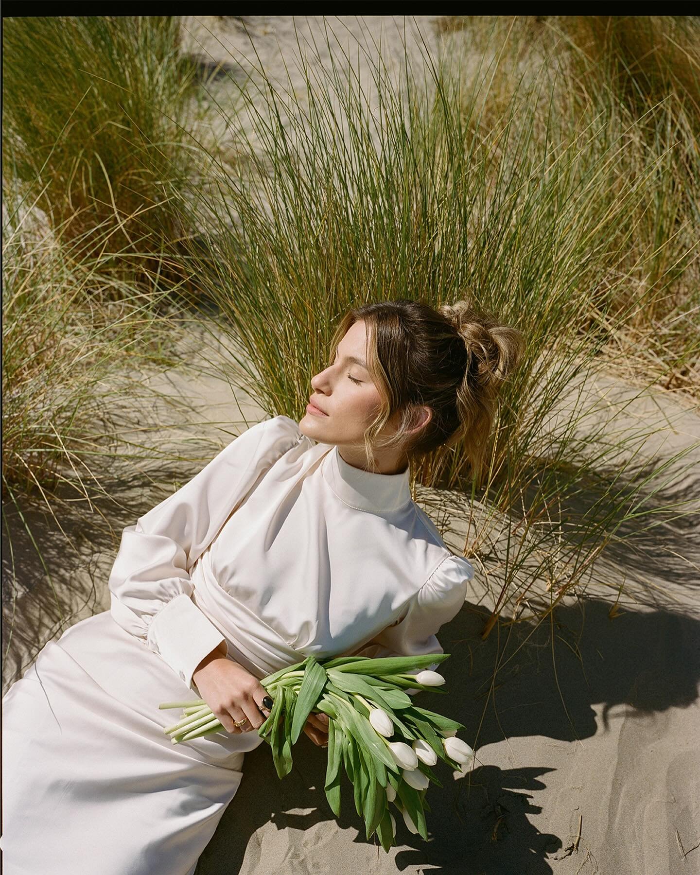 subtle moments in the dune grass with @kaceemoses dancing around in the beauty of central coast. 

captured on Kodak 120 film // shot on  #mamiya7 #120film #120 

developed and scanned: @negativelab