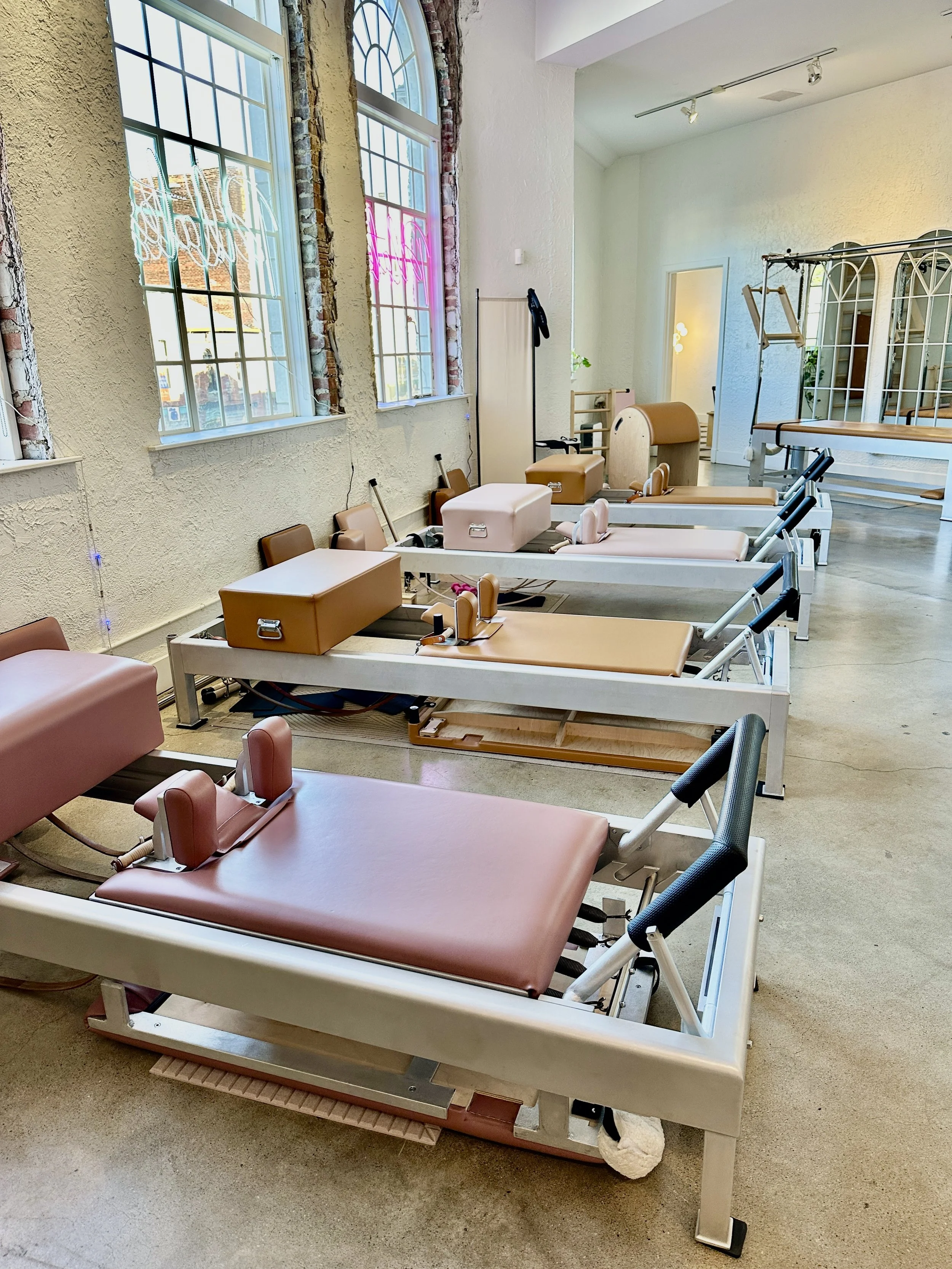 Era pilates studio with classical traditional pilates apparatus. Best pilates studio in Indianapolis. Classical Reformers