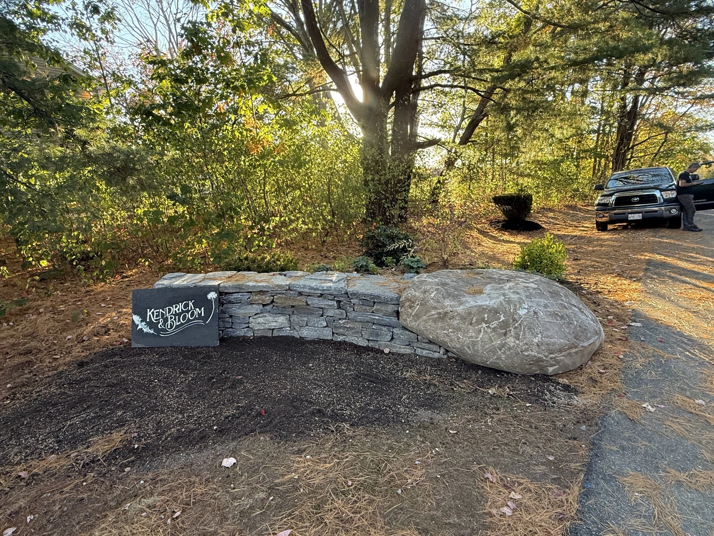 wallwith inset boulder1.jpg