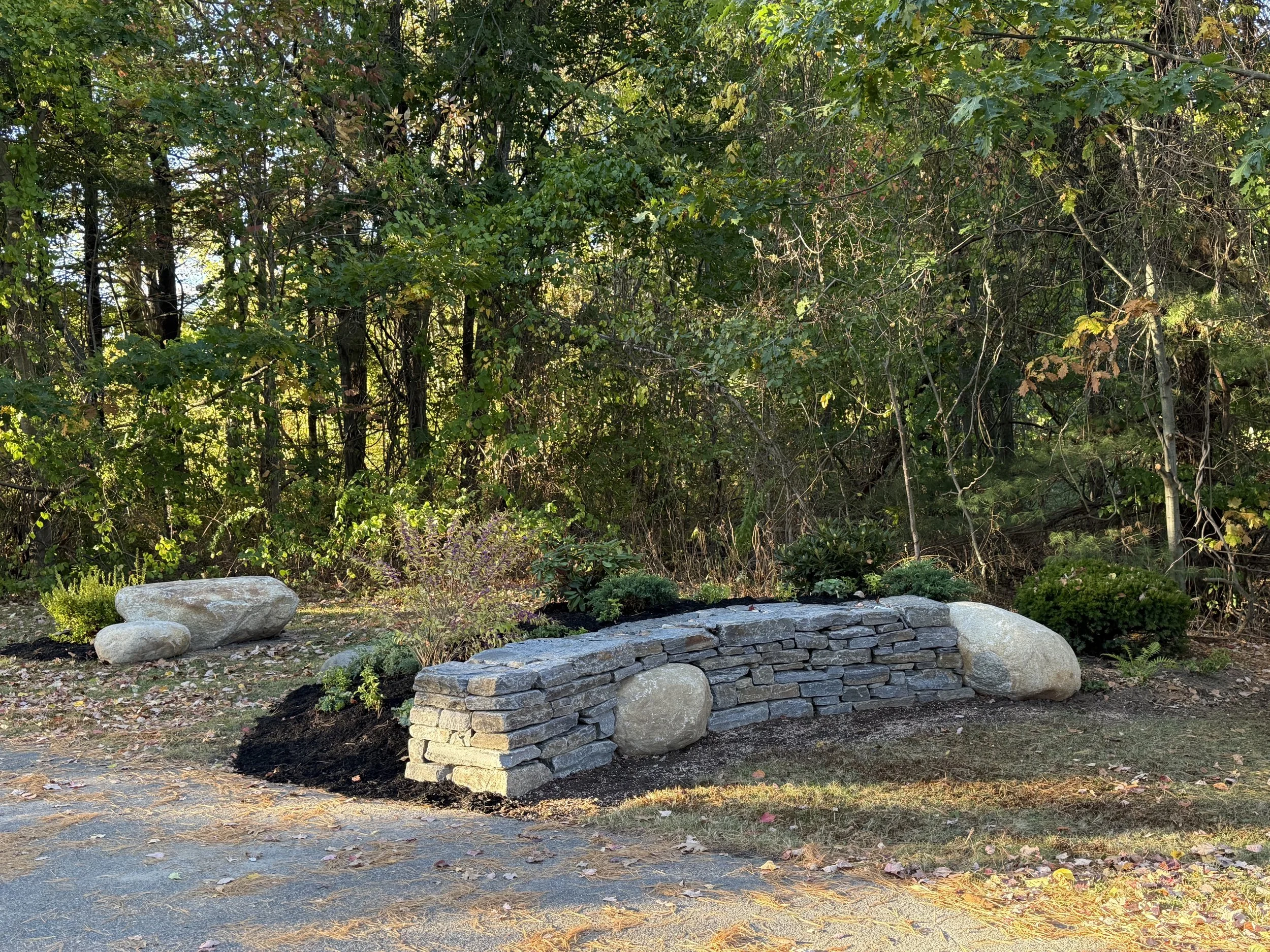 wall with inset boulders.jpg