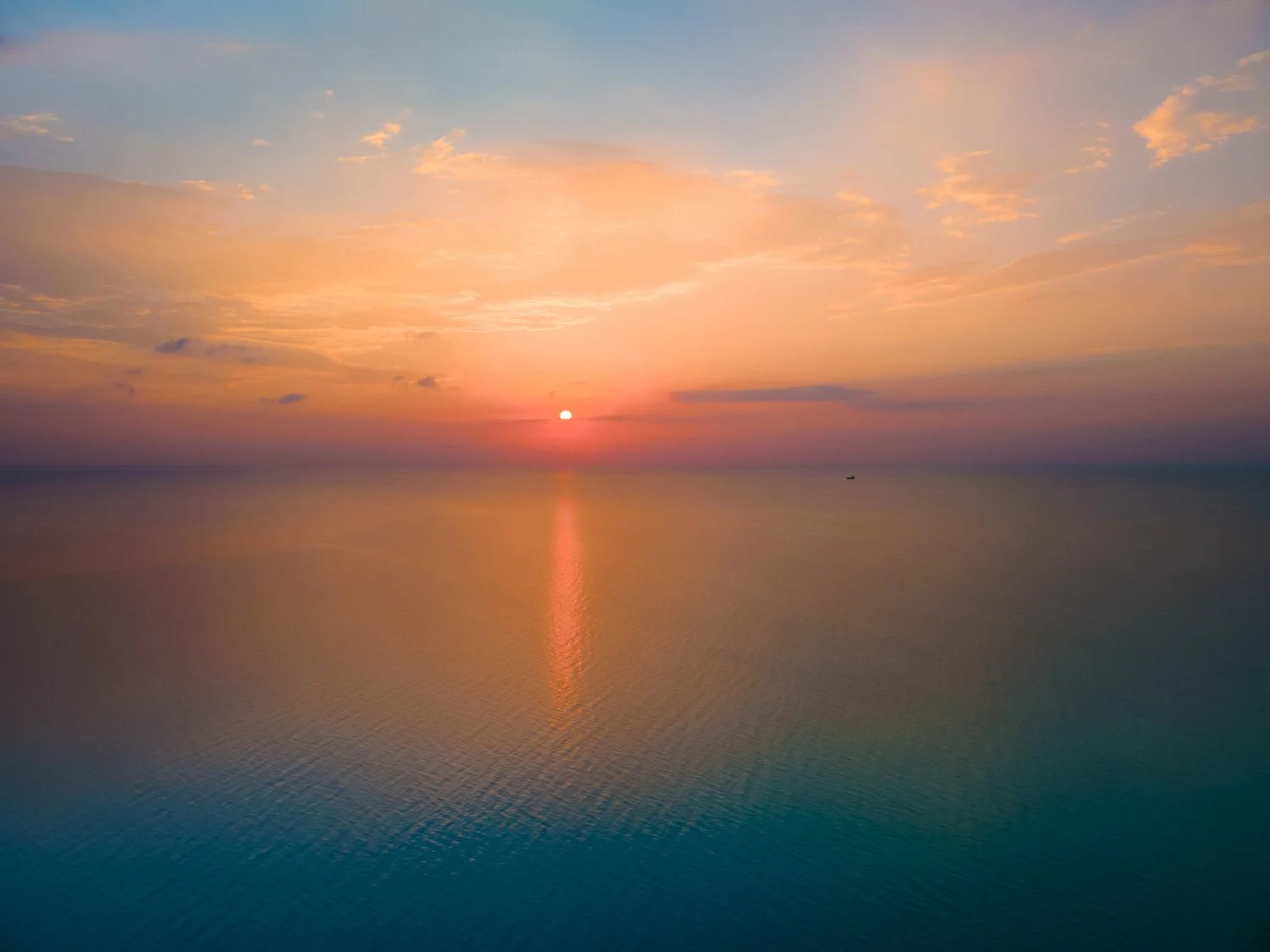 hazy sunrise over the sea - drone photography how to