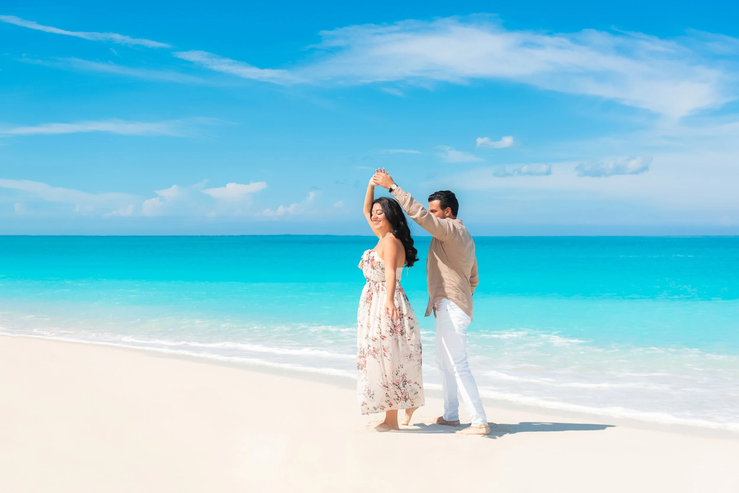 Couple dancing on Grace Bay Beach - Turks and Caicos What to Do
