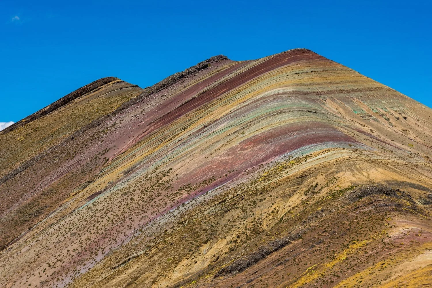 palccoyo rainbow mountain on a sunny day with no people