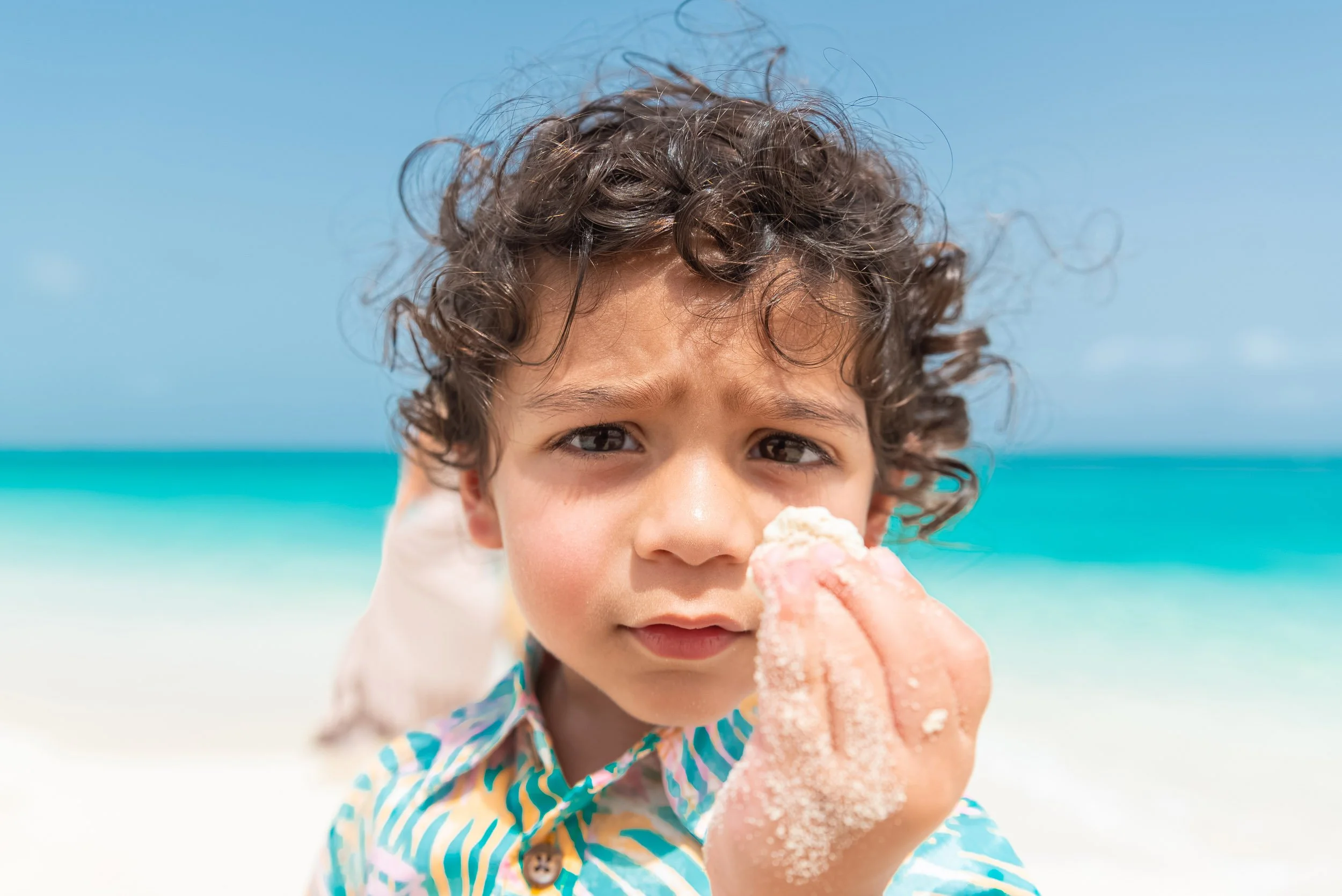 Cute kid on Grace Bay Beach - Turks and Caicos What to Do