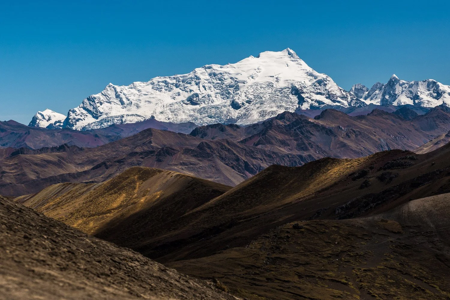 snow capped Mount Ausangate mountain - Andes mountain range, Peru 