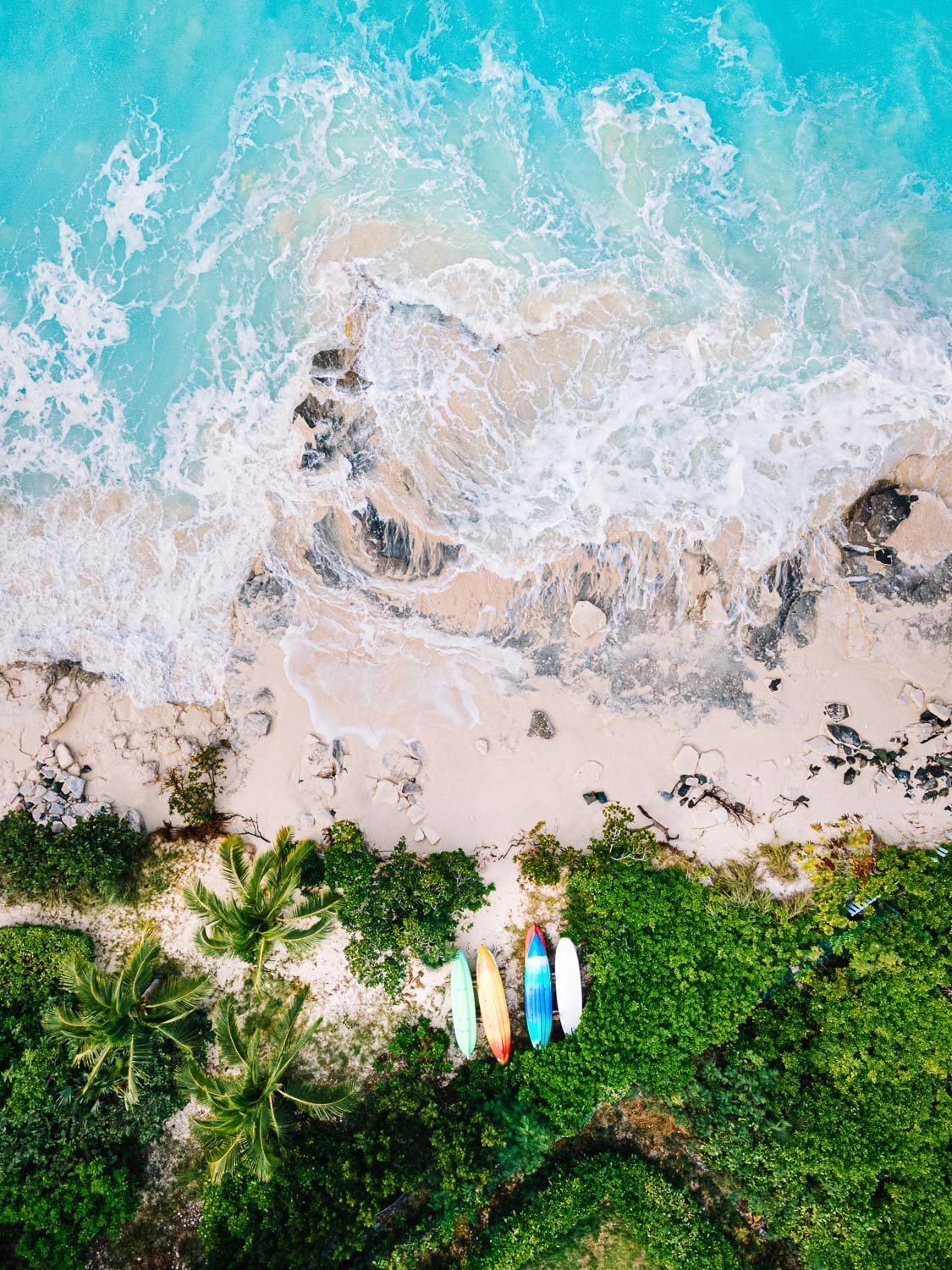 waves crashing on island shore - drone photography how to