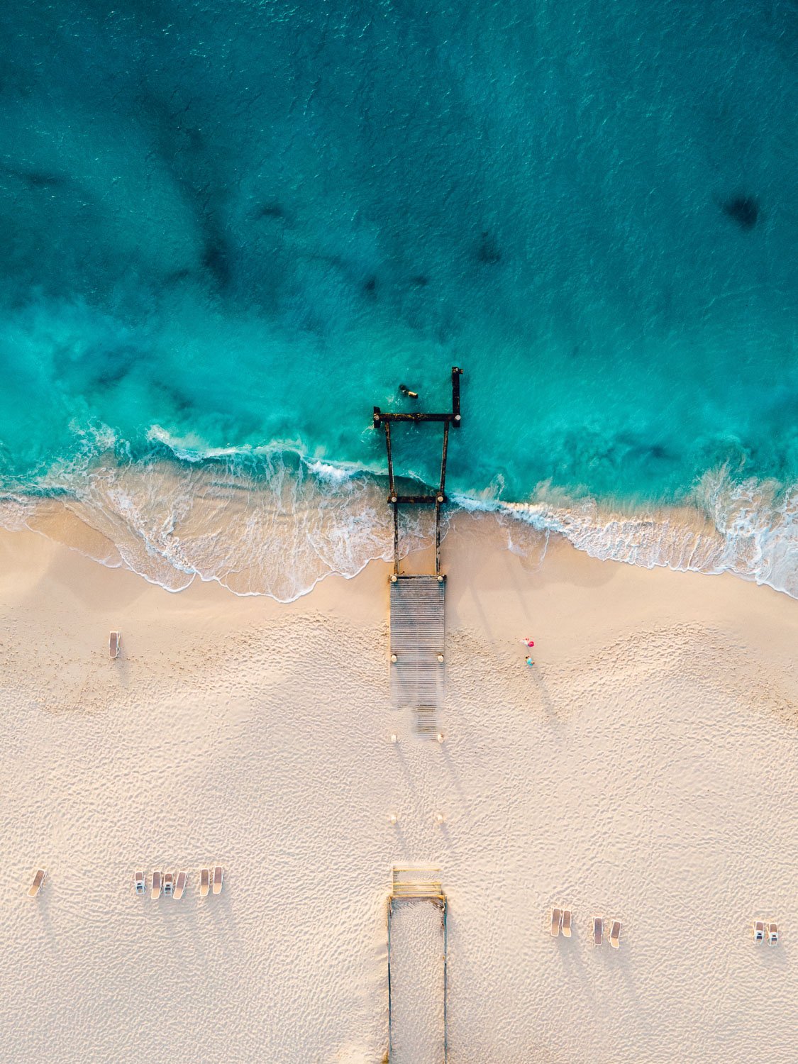 old dock on Caribbean beach - drone photography how to