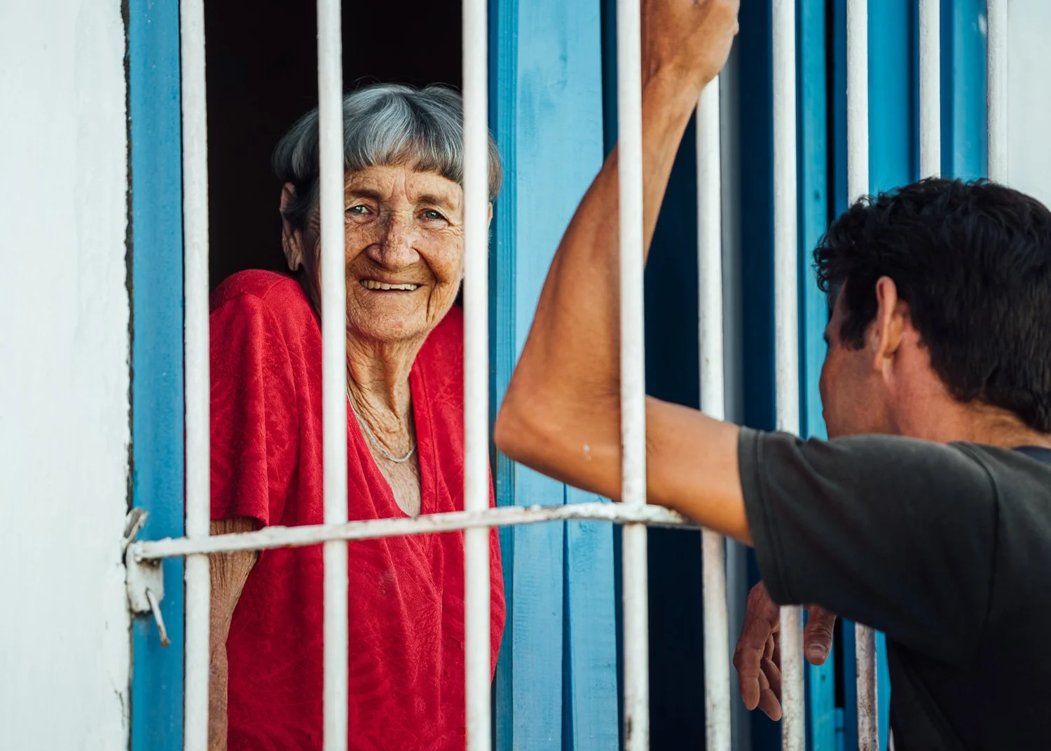 Woman smiling for the camera - visiting Cuba from USA