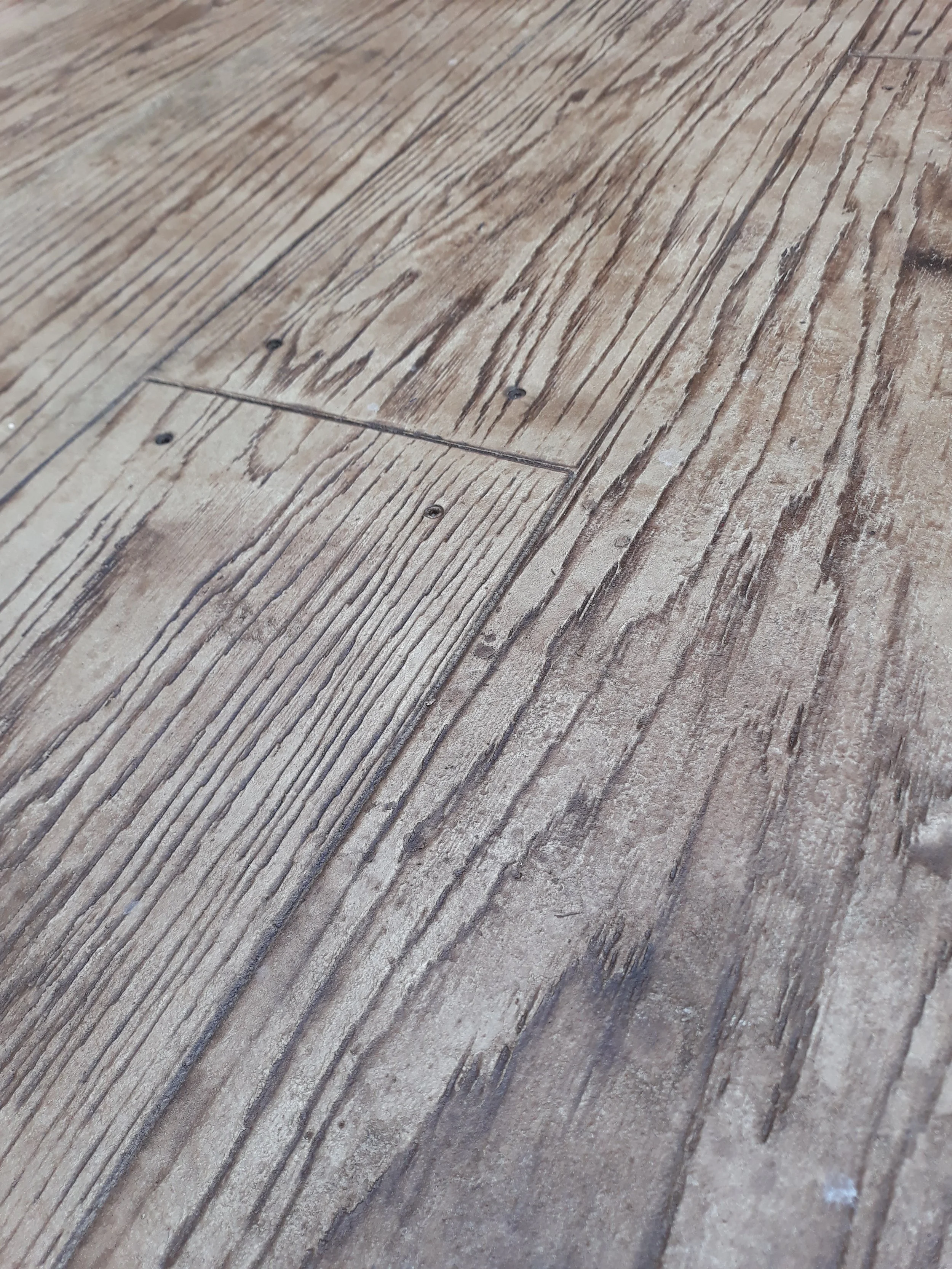 Close-up of textured wooden floor with natural grain pattern