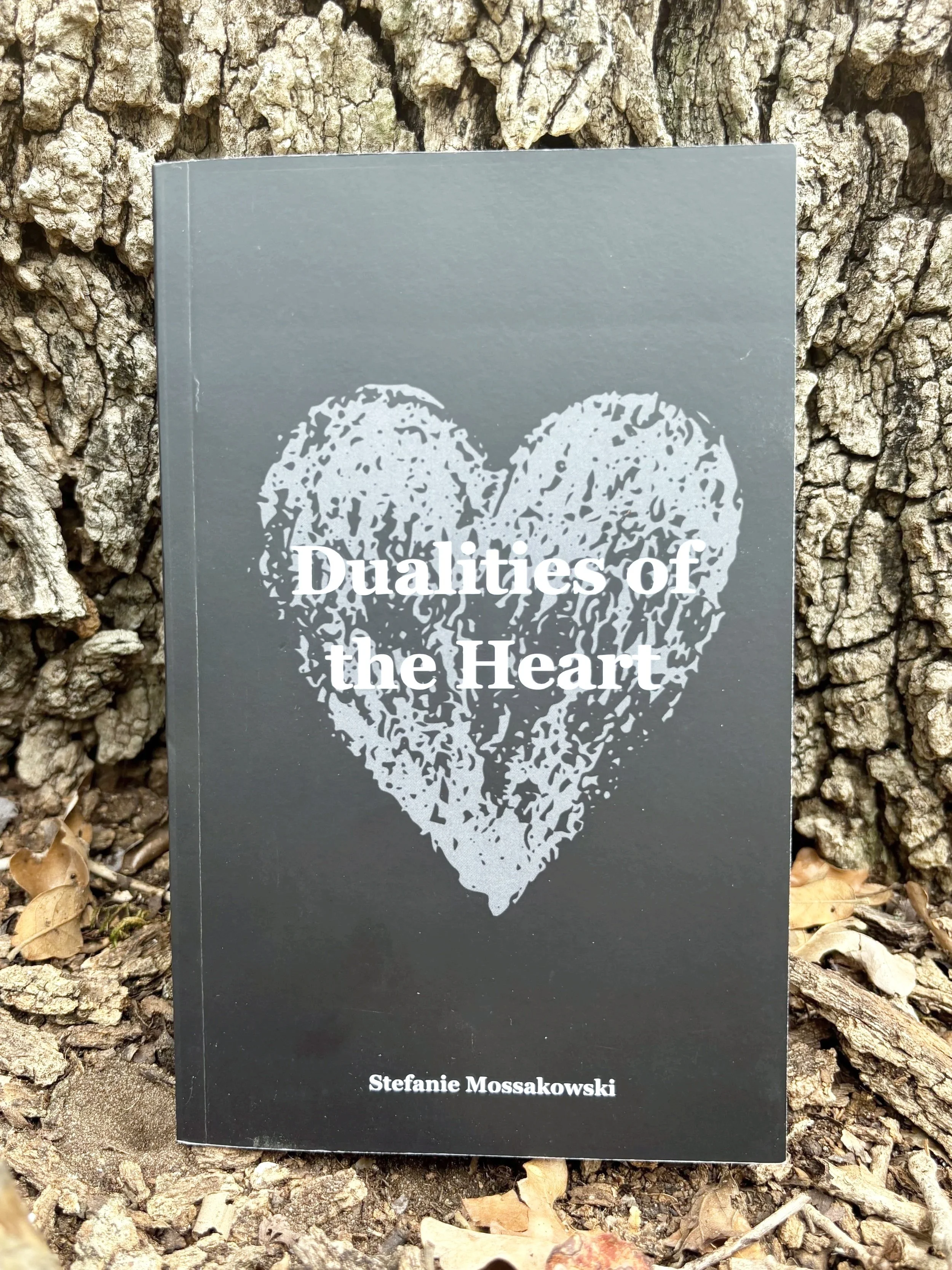 Cover of the published book Dualities of the Heart a collection of poetry essays and cyclical reflections of human transformation by author Stefanie Mossakowski in Elgin, Texas.