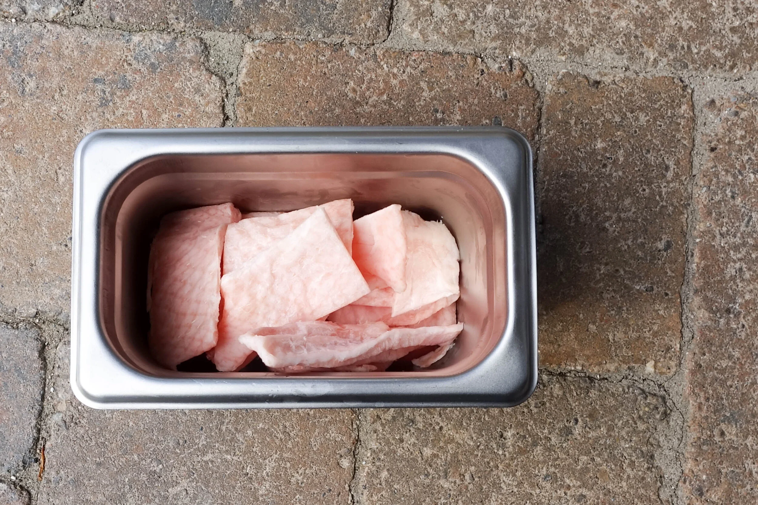 The duck skin has been cut into pieces ready to be cryogenically frozen.