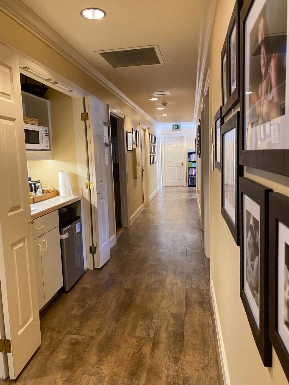 Hallway to Suites and Client Kitchenette