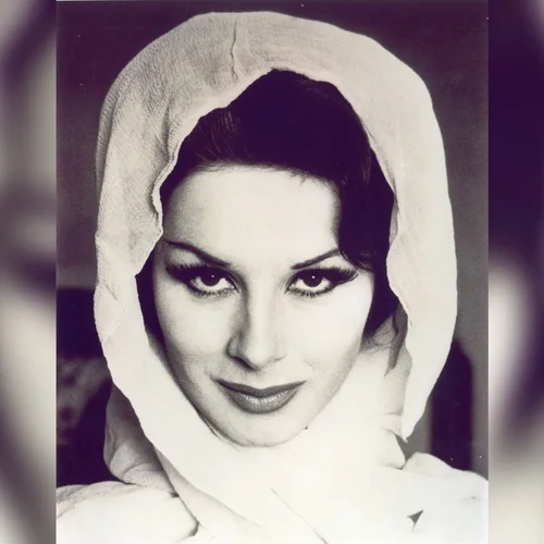 April Ashley, who was very glamorous. She is wearing a headscarf and looking directly into the camera