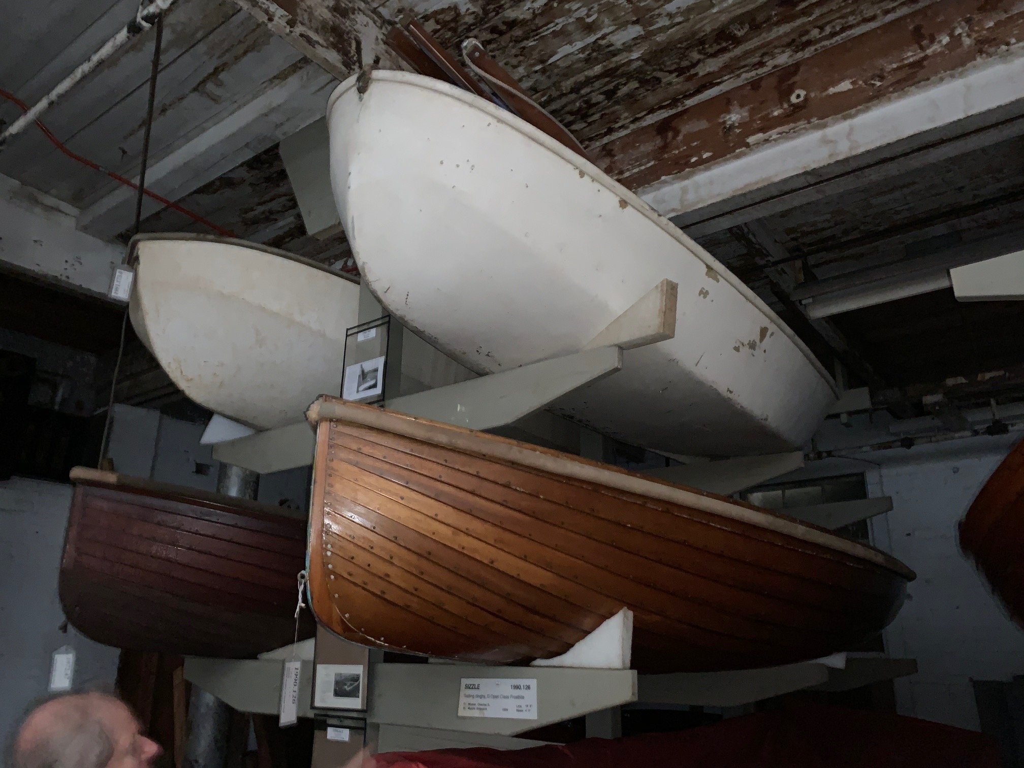 A rack full of frostbite dinghy history, the Dyer Dhow on top