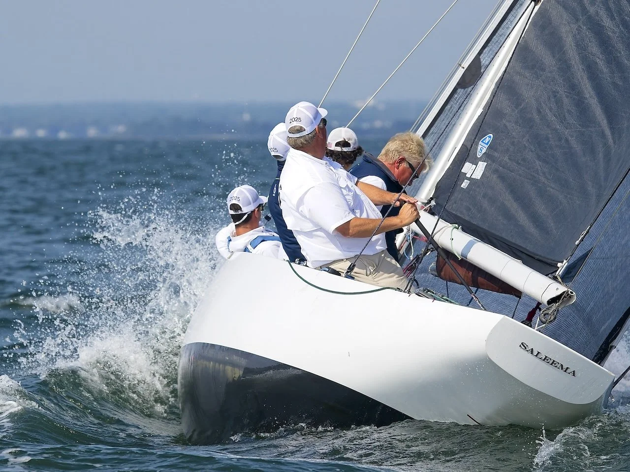 Local Oyster Bay crew headed by Will Meyer and Bill Mooney work their 1928 Saleema upwind