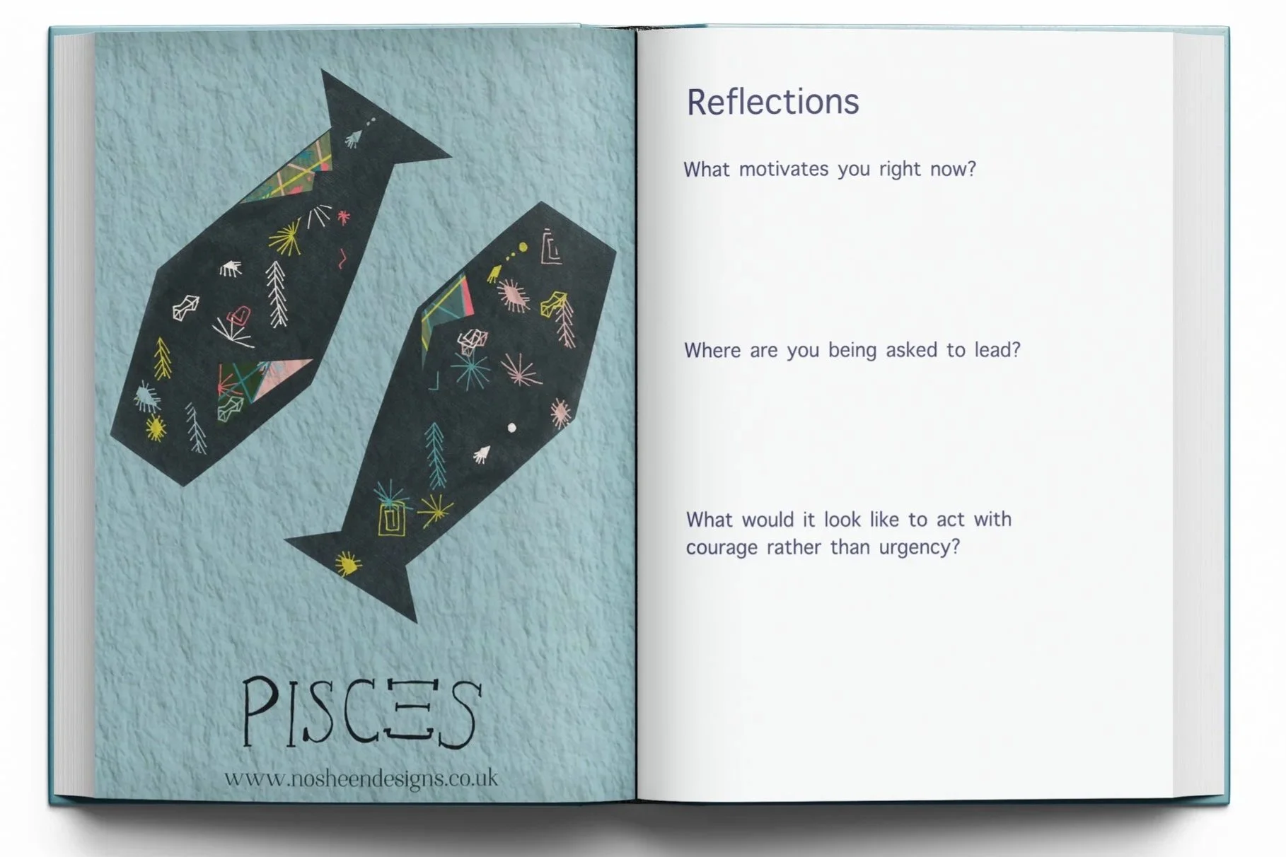Open book showing a page about Pisces zodiac sign with an illustration of two black fish with colorful patterns and the word 'Pisces' at the bottom. The right page contains reflective questions about motivation, leadership, and courage.