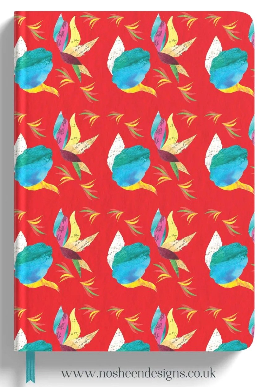 A red fabric with a colorful parrots pattern, featuring blue and yellow parrots with green and purple details, evenly repeated across the material.