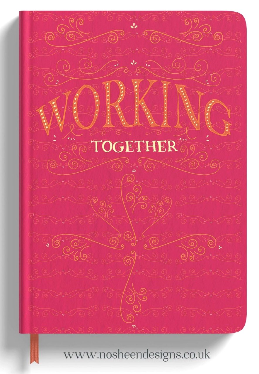 Pink notebook cover with decorative gold swirls and the words "Working Together" in gold and white text.