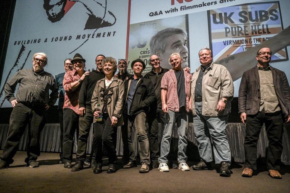  L-R: Paul Bishow, Dan Palenski, Mark Noone, Sam Lavine, Martha Hull, Kim Kane, James June Schneider, Marshall Keith, Andy Von Brand, and Chris Rounds at the film’s World Premiere at the American Film Institute. Photo by Bill O’Leary. 