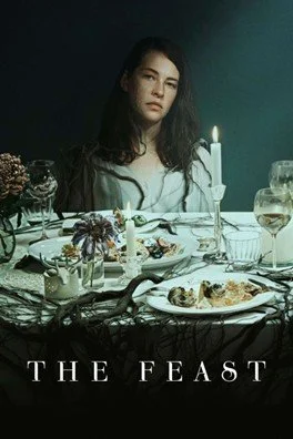 English movie poster for The Feast. A young white woman sits at a white decorated table with candles, mushrooms, fruits. Tree roots creep over the table. The woman has a blank, neutral expression as she stares directly at the viewer