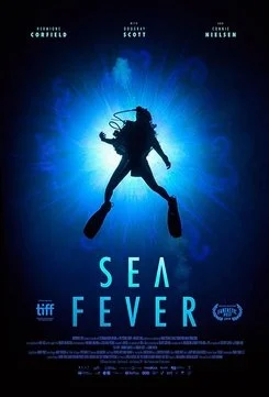 A scuba diver under water, in the middle of the poster - they look caught in a bright, blue light.
