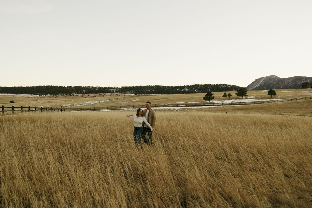 a couple slow dances at Spruce Mountain Ranch during their winter engagement session