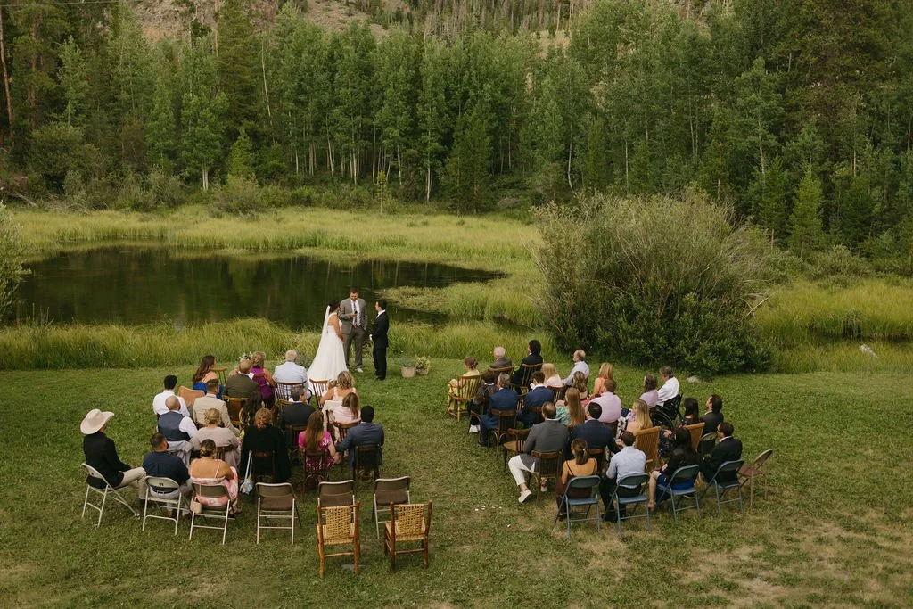 An outdoor intimate wedding ceremony at Snowy Range Lodge near Centennial, Wyoming.