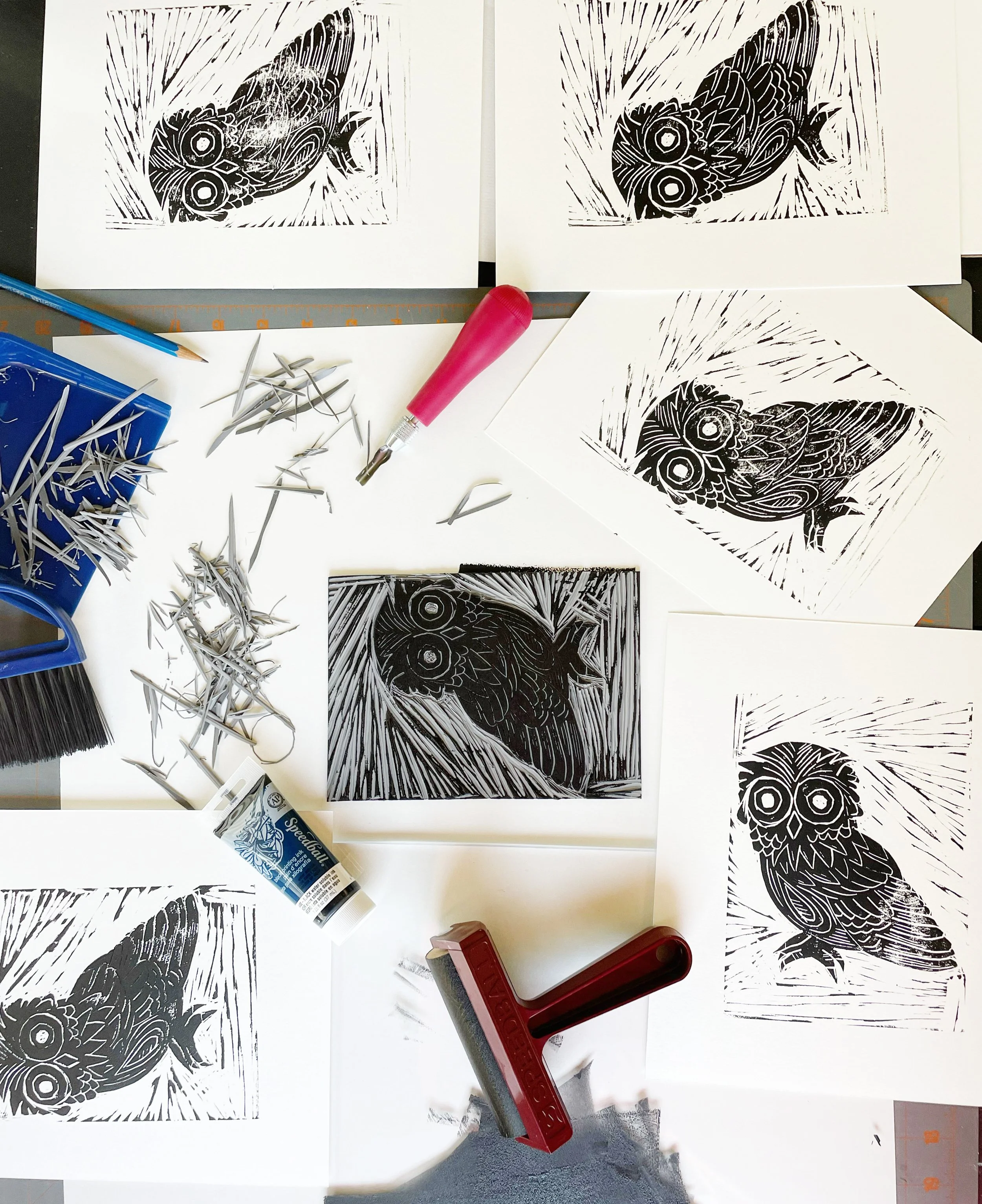 Original lino carving and print making of an owl design. 
