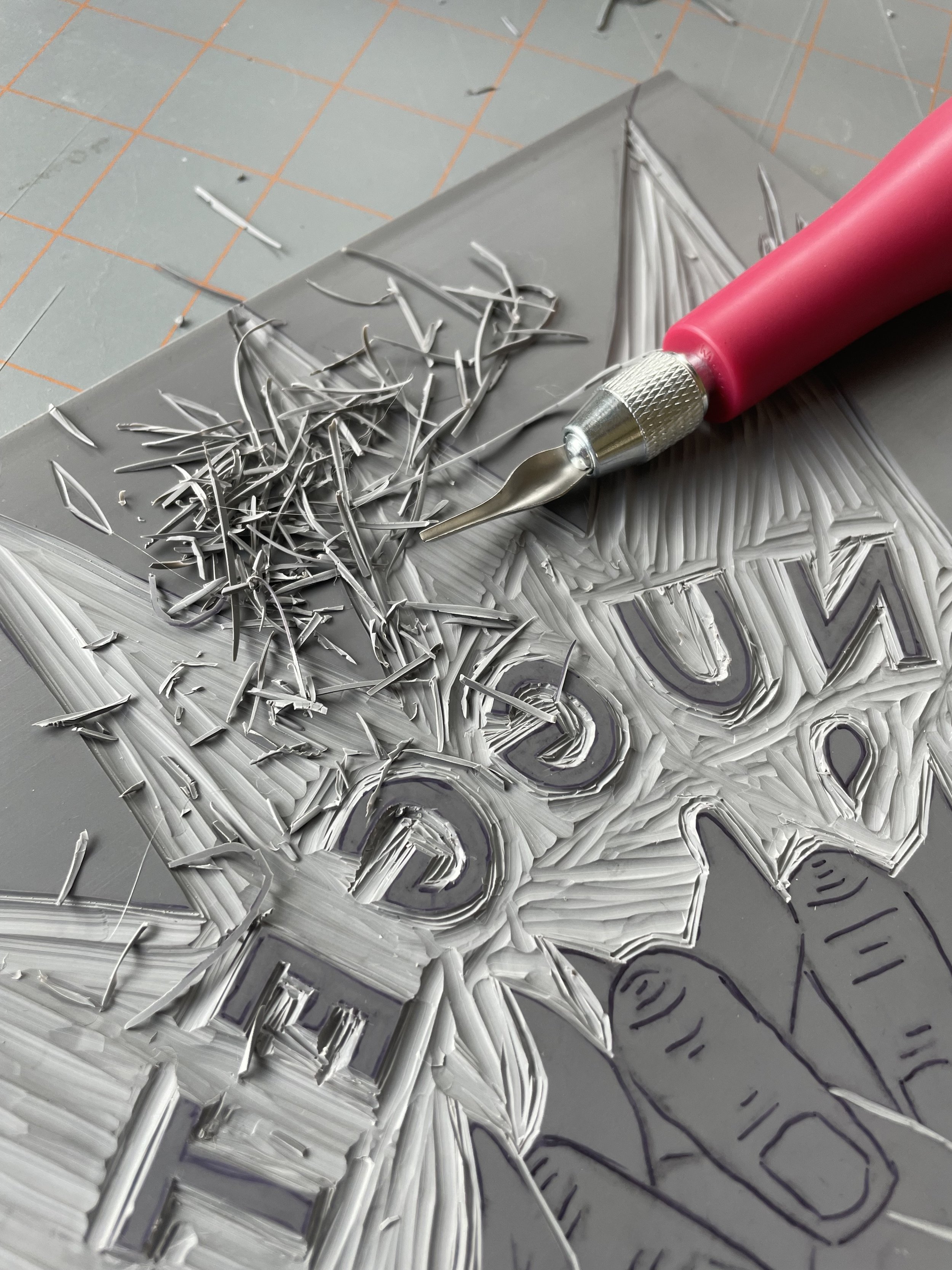 Carving process of linoleum to create a lino print for Troegs brewing Nugget Nectar. 