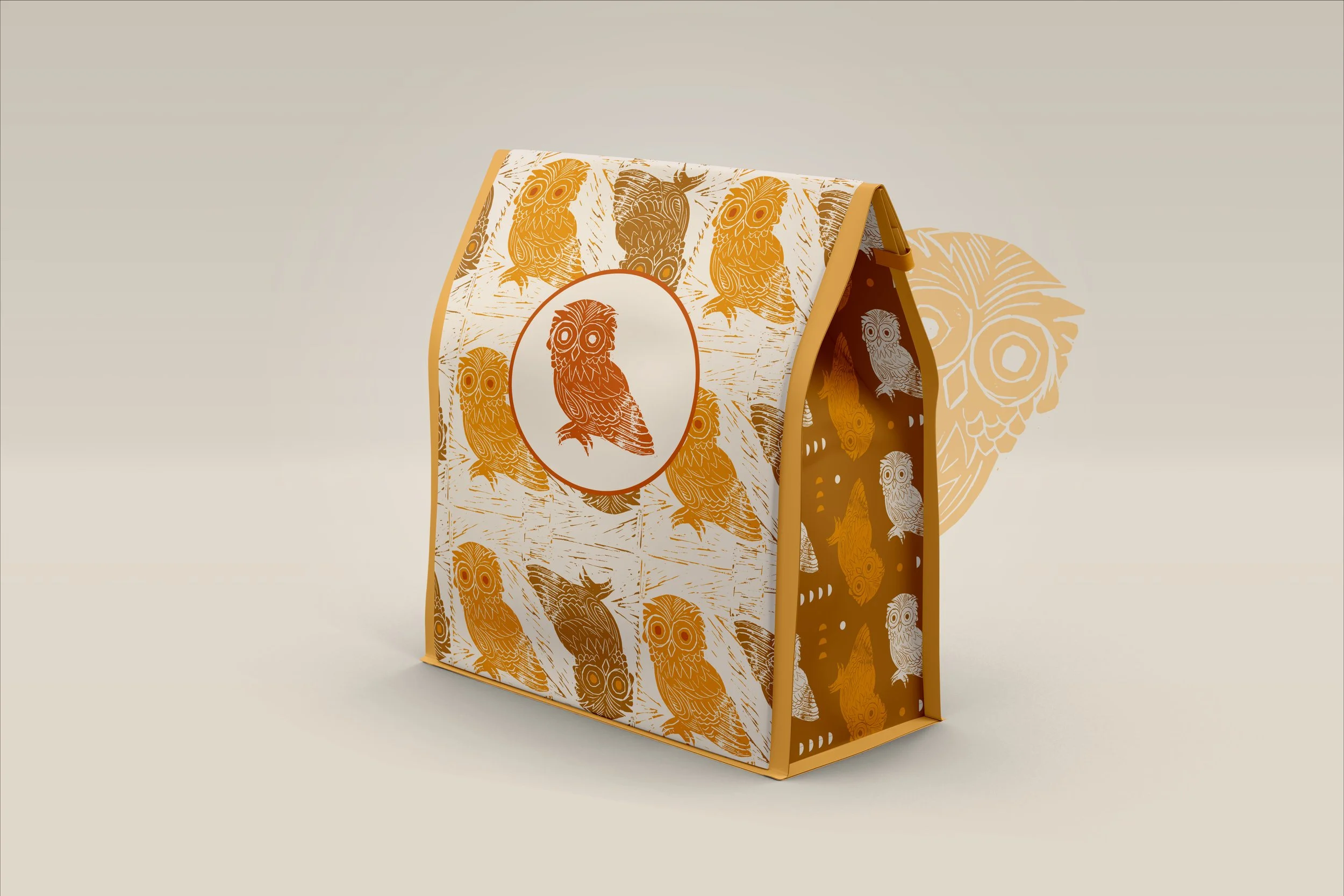 Packaging design with retro vibes showing a repeat pattern of an owl design that was carved as a lino cut print.