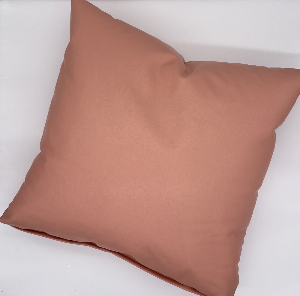 Pink floor outlet pillow