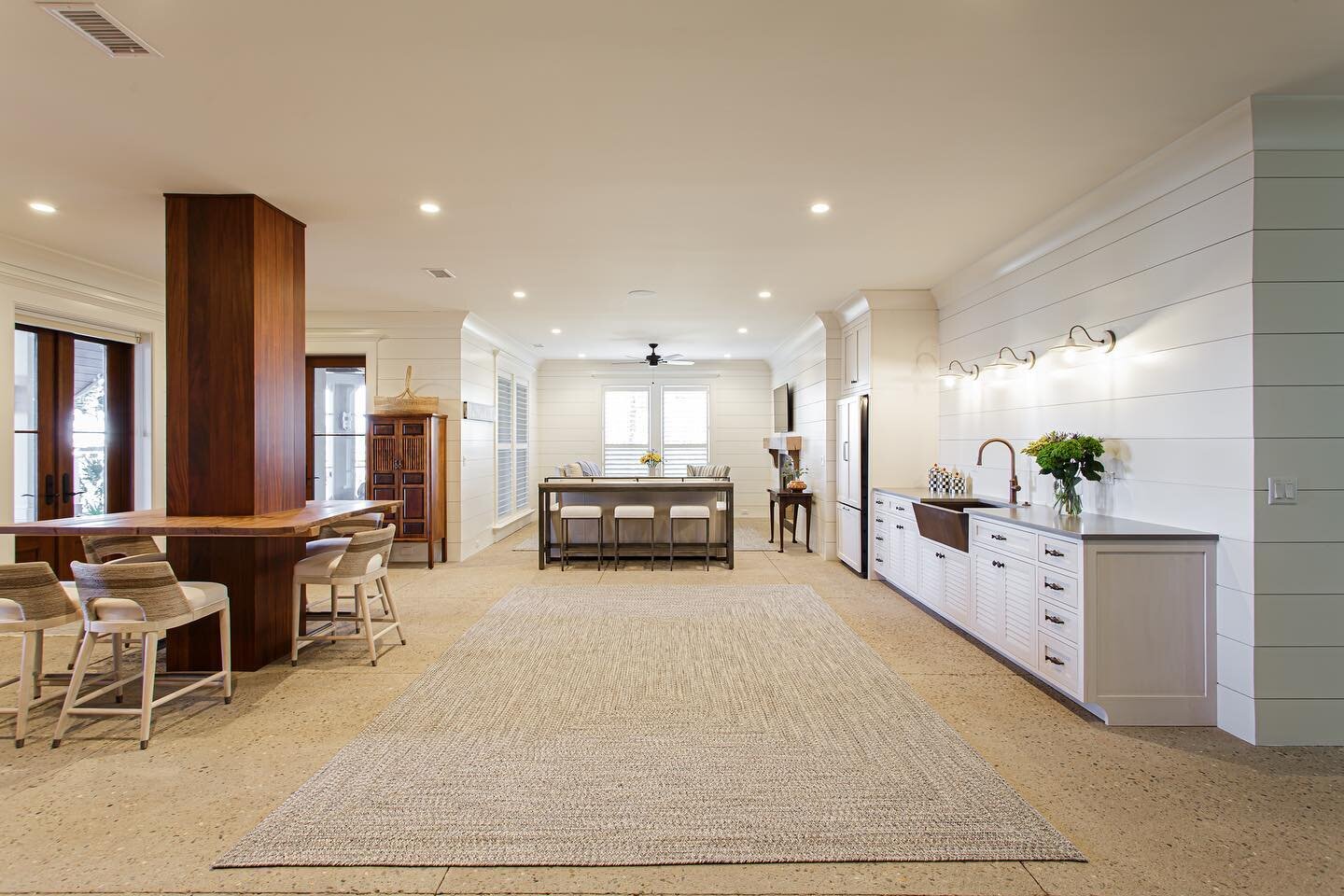 This lower level sitting room is the perfect place to relax after a workout in the beautiful home gym!