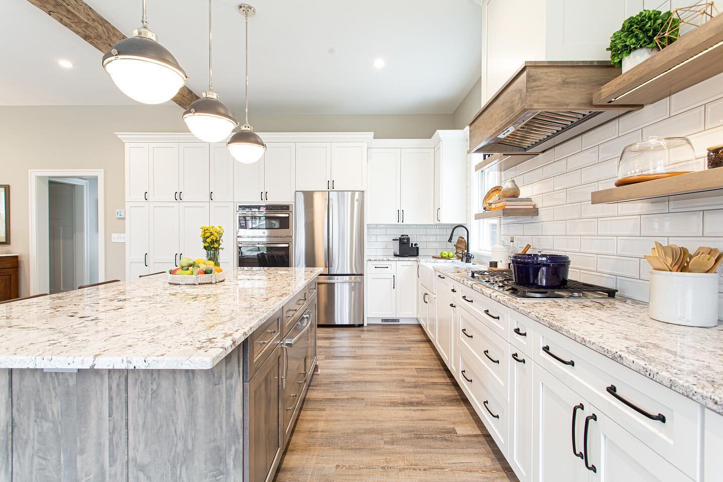 This beautiful new kitchen is just asking to be filled with lots of good friends and food. Cheers to the weekend!