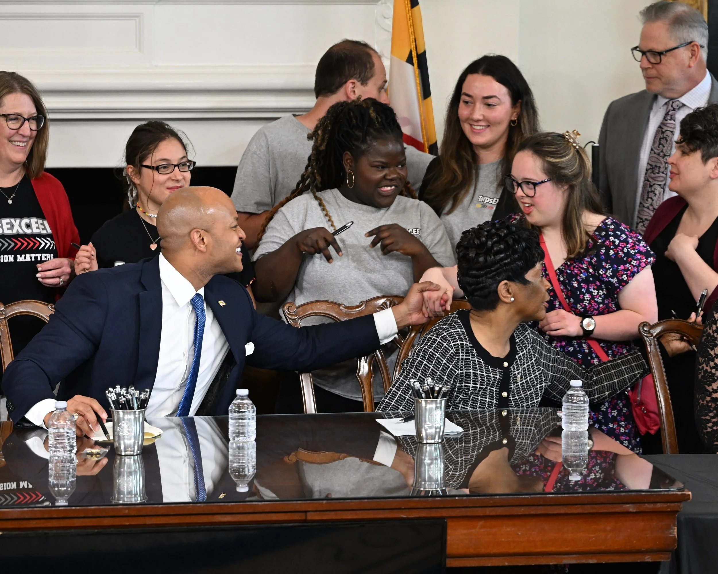Gov Moore TE signing.JPEG
